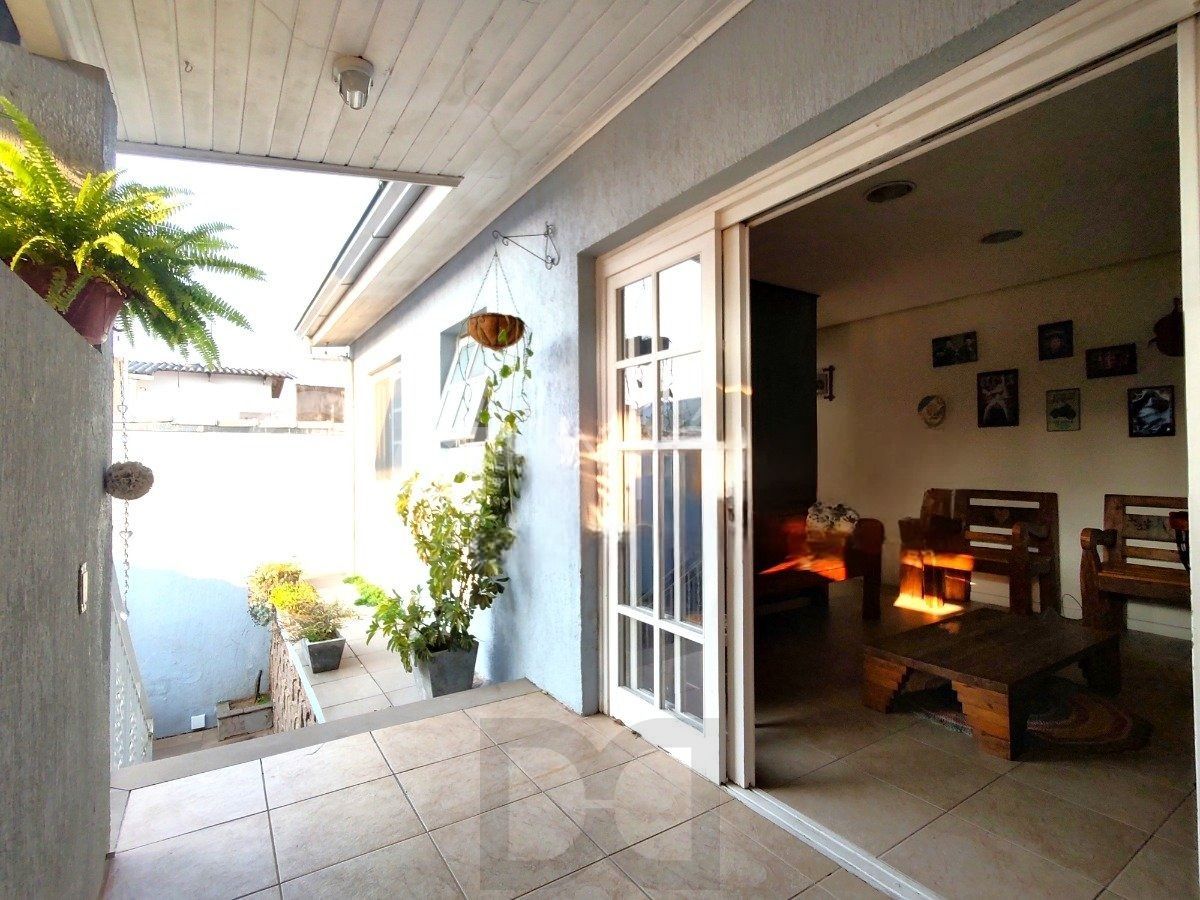 Casa com 4 dormitórios, espaço gourmet e terraço na Zona Norte de Porto Alegre — foto 17