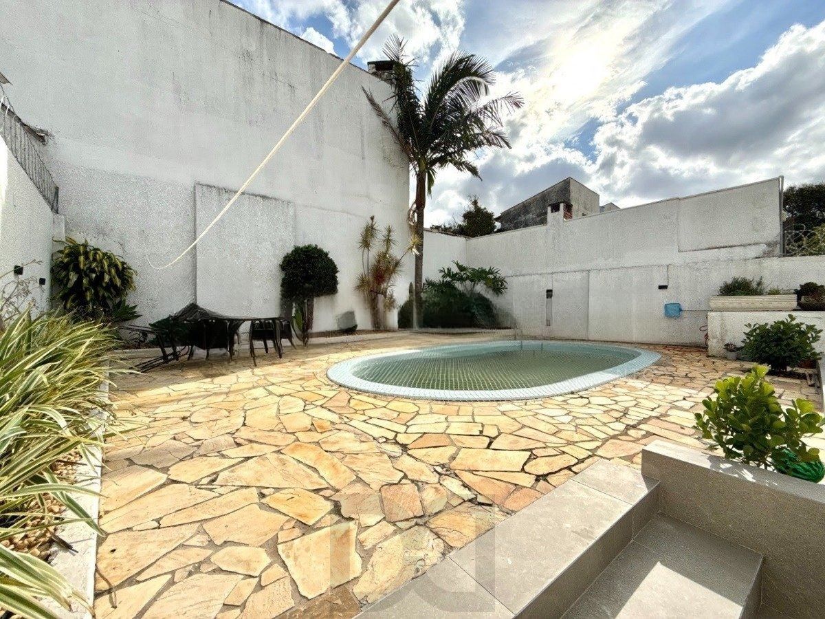 Casa ampla com 4 dormitórios, suíte e área de lazer- Passo da Areia — foto 31