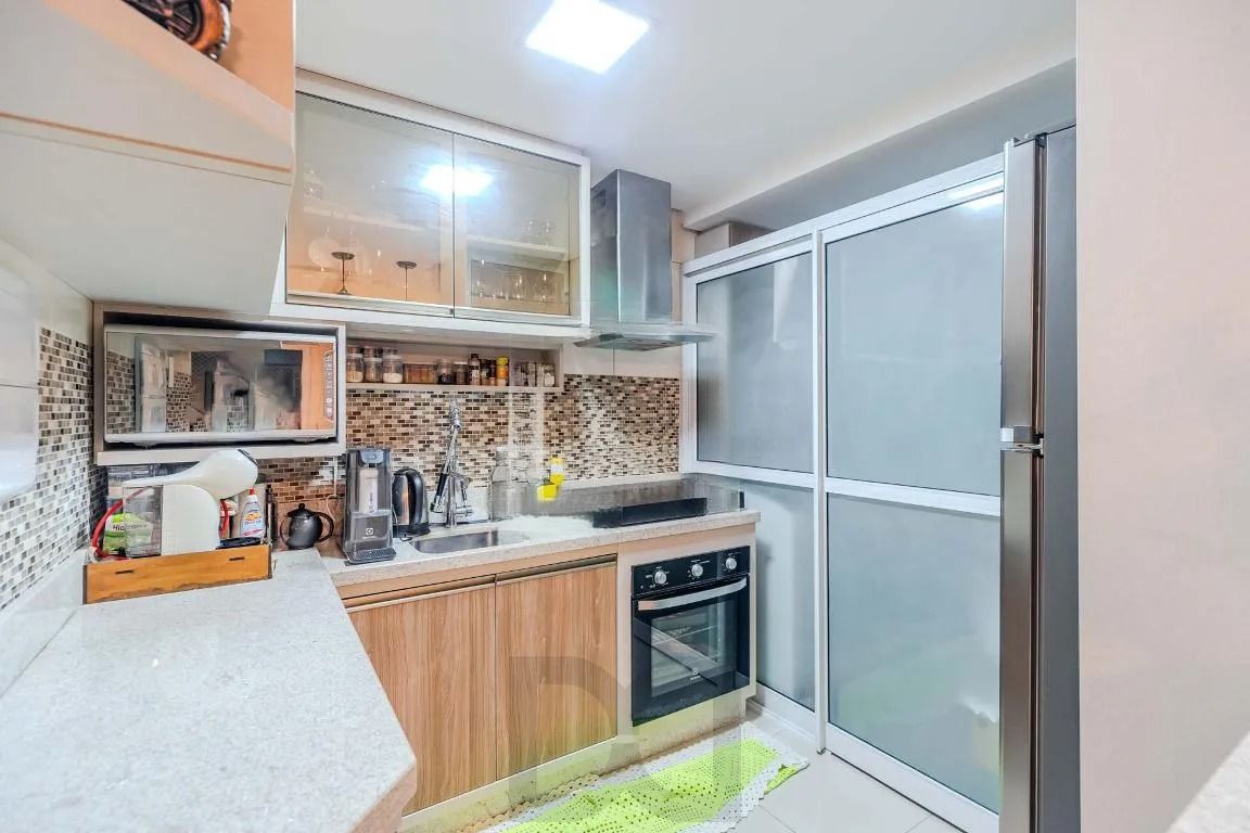 Apartamento com 3 dormitórios, suíte, sacada com churrasqueira e 1 vaga. — foto 18