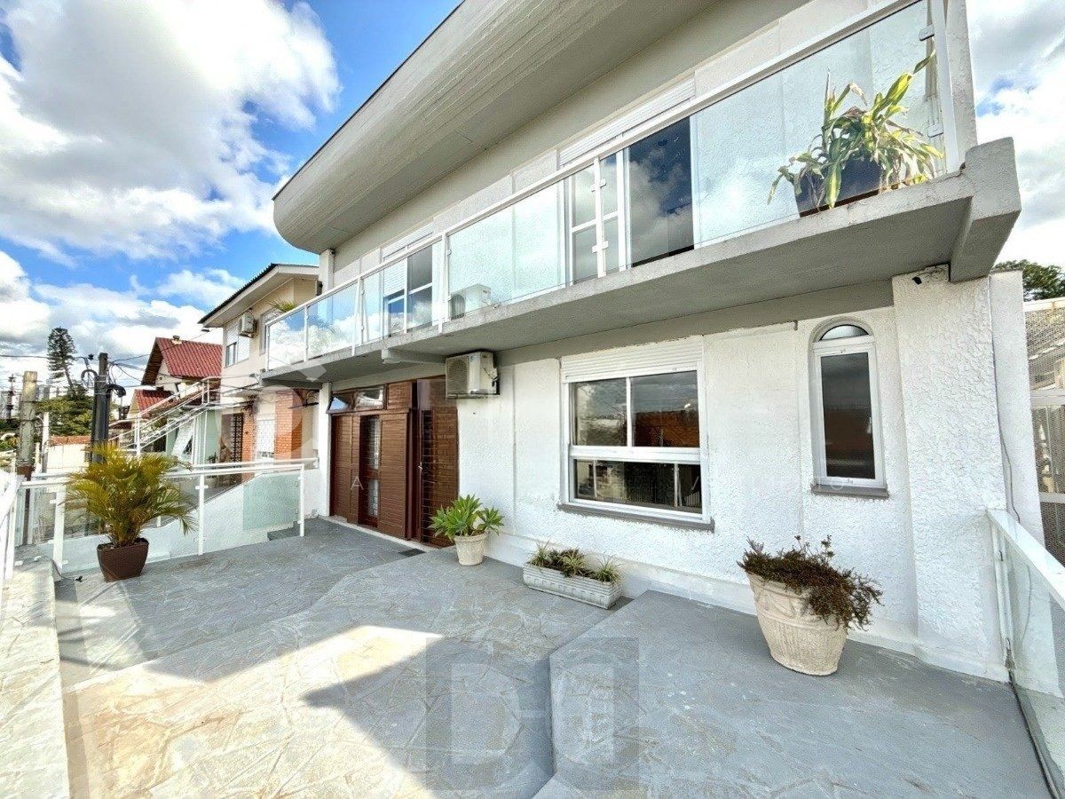 Casa ampla com 4 dormitórios, suíte e área de lazer- Passo da Areia — foto 40