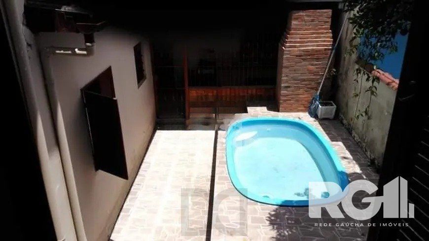 Casa Ampla com Piscina e 4 Dormitórios no Rubem Berta — foto 1