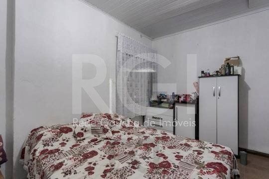 Casa composta por seis(6) dormitórios, no bairro Passo da Areia em Porto Alegre/RS. — foto 10