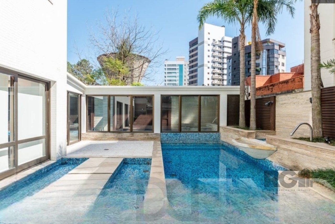 Casa no bairro Boa Vista em porto alegre com piscina, churrasqueira, lareira e garagem para 3 carros. — foto 20