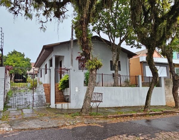 Casa em Porto Alegre, no bairro Tristeza, com 3 dormitório(s), e 3 banheiros, à venda. — foto 1
