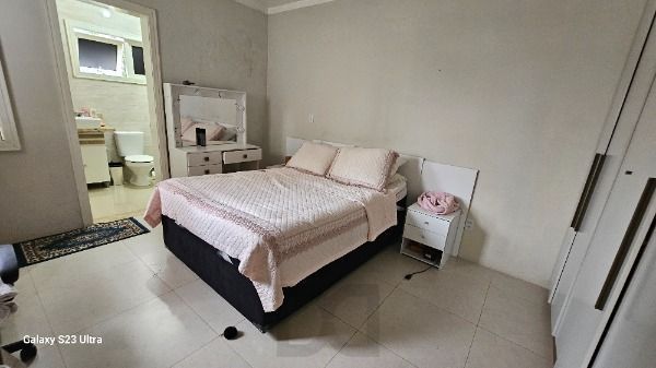 Casa em Porto Alegre, no bairro Hípica, com 3 dormitório(s), e 3 banheiros, à venda. — foto 16