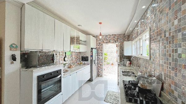 Casa em Porto Alegre, no bairro Hípica, com 2 dormitório(s), e 2 banheiros, à venda. — foto 15