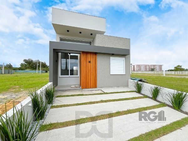 Casa Condominio em Porto Alegre, no bairro Hípica, com 3 dormitório(s), e 3 banheiros, à venda. — foto 2