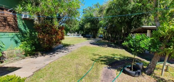 Casa em Porto Alegre, no bairro Ponta Grossa, com 3 dormitório(s), e 3 banheiros, à venda. — foto 18