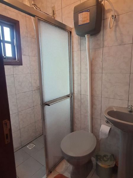 Casa em Porto Alegre, no bairro Vila Nova, com 4 dormitório(s), e 4 banheiros, à venda. — foto 23