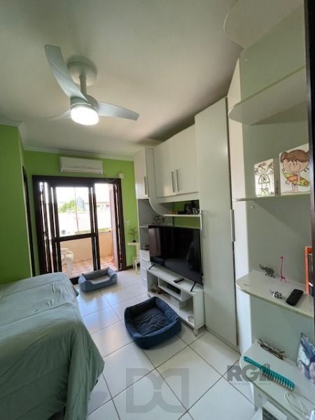 Casa em Porto Alegre, no bairro Hípica, com 3 dormitório(s), e 3 banheiros, à venda. — foto 13