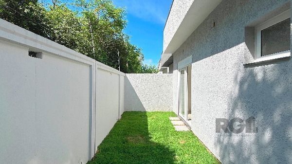 Casa Condominio em Porto Alegre, no bairro Hípica, com 3 dormitório(s), e 3 banheiros, à venda. — foto 33
