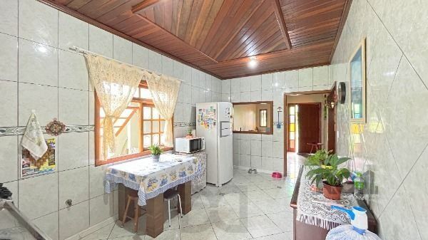 Casa em Porto Alegre, no bairro Lageado, com 3 dormitório(s), e 3 banheiros, à venda. — foto 9