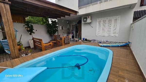 Casa em Porto Alegre, no bairro Hípica, com 3 dormitório(s), e 3 banheiros, à venda. — foto 47
