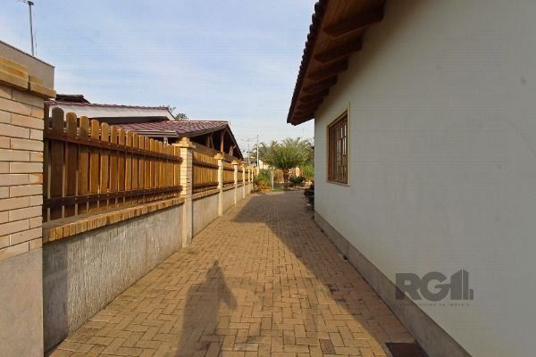 Casa em Porto Alegre, no bairro Belém Novo, com 3 dormitório(s), e 3 banheiros, à venda. — foto 37