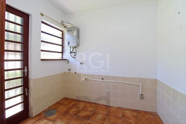 Casa em Porto Alegre, no bairro Ipanema, com 3 dormitório(s), e 3 banheiros, à venda. — foto 18