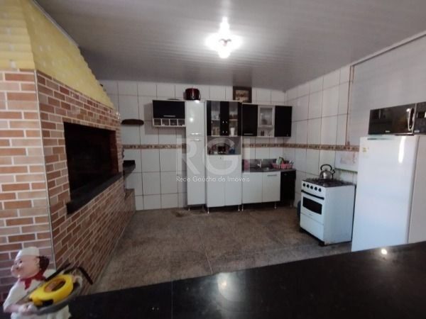 Casa em Porto Alegre, no bairro Belém Novo, com 5 dormitório(s), e 5 banheiros, à venda. — foto 21