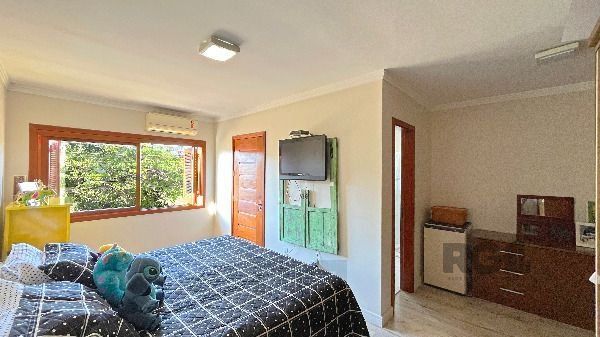 Casa em Porto Alegre, no bairro Hípica, com 3 dormitório(s), e 3 banheiros, à venda. — foto 28