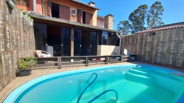 Casa em Porto Alegre, no bairro Hípica, com 3 dormitório(s), à venda. — foto 22