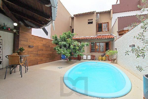 Casa em Porto Alegre, no bairro Hípica, com 3 dormitório(s), e 3 banheiros, à venda. — foto 23