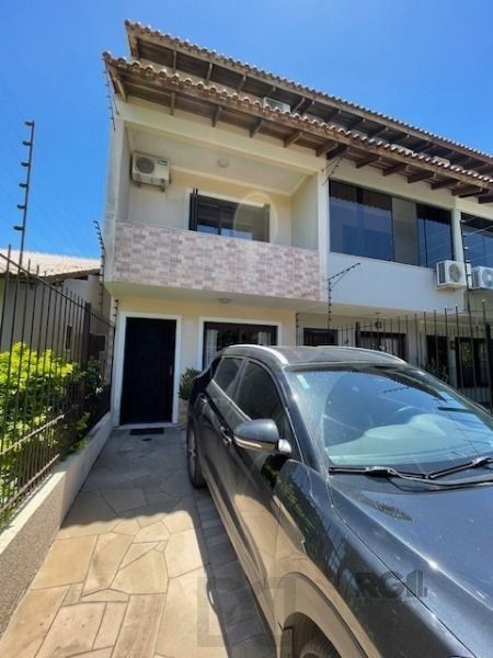 Casa em Porto Alegre, no bairro Hípica, com 3 dormitório(s), e 3 banheiros, à venda. — foto 1