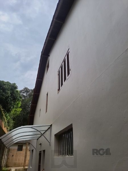 Casa em Porto Alegre, no bairro Vila Nova, com 4 dormitório(s), e 4 banheiros, à venda. — foto 24