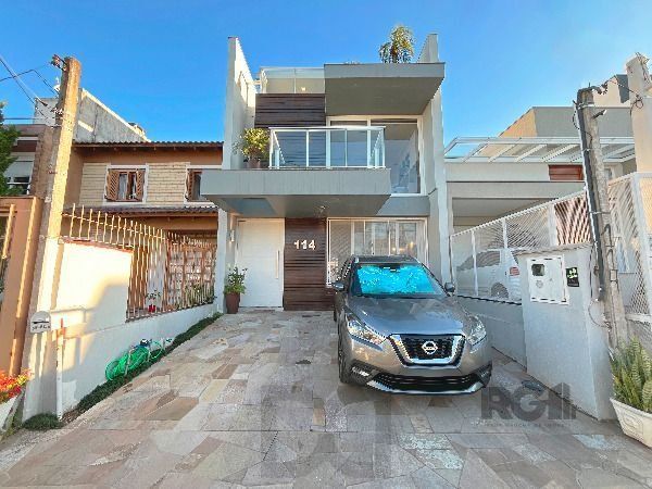 Casa em Porto Alegre, no bairro Hípica, com 3 dormitório(s), e 3 banheiros, à venda. — foto 3