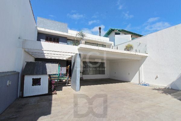 Casa para Venda - 400m², 4 dormitórios, sendo 2 suites, 4 vagas - Guarujá — foto 2