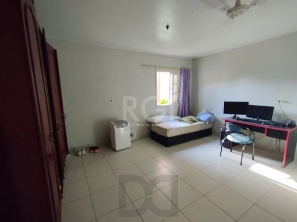 Casa em Porto Alegre, no bairro Belém Novo, com 5 dormitório(s), e 5 banheiros, à venda. — foto 28