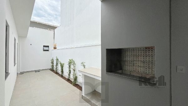 Casa em Porto Alegre, no bairro Hípica, com 3 dormitório(s), e 3 banheiros, à venda. — foto 23