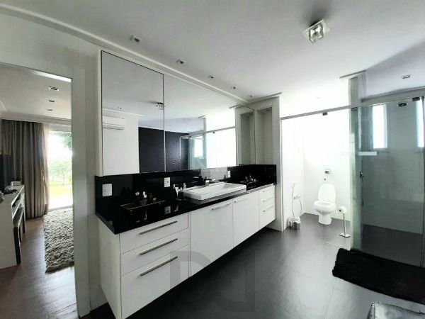 Casa Condominio em Porto Alegre, no bairro Belém Novo, com 3 dormitório(s), e 3 banheiros, à venda. — foto 13