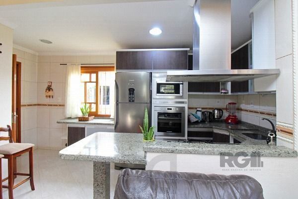 Casa em Porto Alegre, no bairro Belém Novo, com 3 dormitório(s), e 3 banheiros, à venda. — foto 25