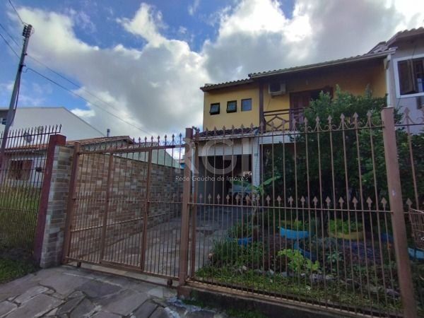 Casa em Porto Alegre, no bairro Hípica, com 3 dormitório(s), e 3 banheiros, à venda. — foto 2