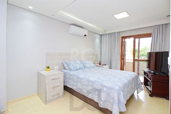 Casa em Porto Alegre, no bairro Hípica, com 3 dormitório(s), e 3 banheiros, à venda. — foto 24