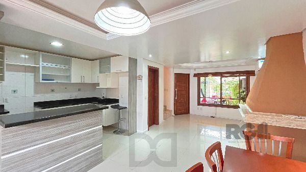 Casa em Porto Alegre, no bairro Hípica, com 3 dormitório(s), e 3 banheiros, à venda. — foto 11