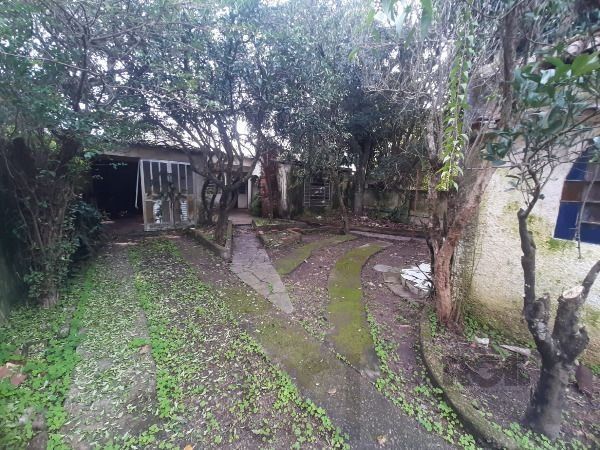 Casa em Porto Alegre, no bairro Cristal, com 4 dormitório(s), e 4 banheiros, à venda. — foto 34