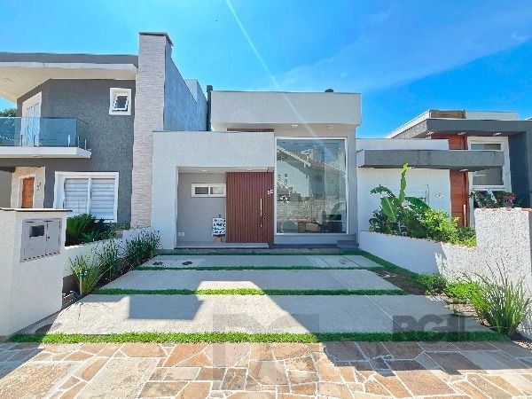 Casa Condominio em Porto Alegre, no bairro Hípica, com 3 dormitório(s), e 3 banheiros, à venda. — foto 1