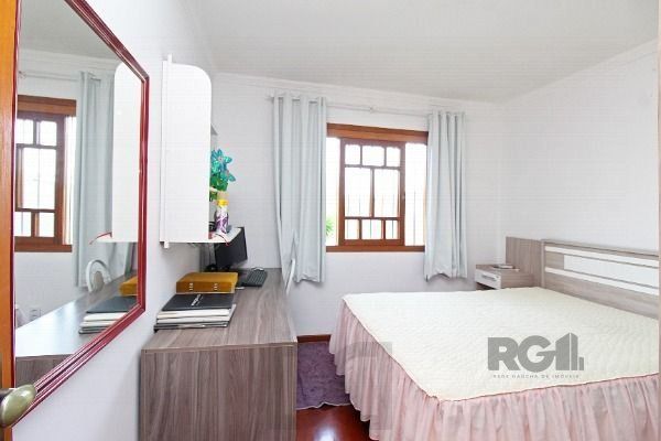 Casa em Porto Alegre, no bairro Belém Novo, com 3 dormitório(s), e 3 banheiros, à venda. — foto 15