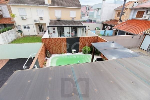 Casa em Porto Alegre, no bairro Hípica, com 3 dormitório(s), e 3 banheiros, à venda. — foto 35