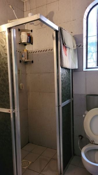 Casa em Porto Alegre, no bairro Santo Antônio, com 3 dormitório(s), e 3 banheiros, à venda. — foto 9