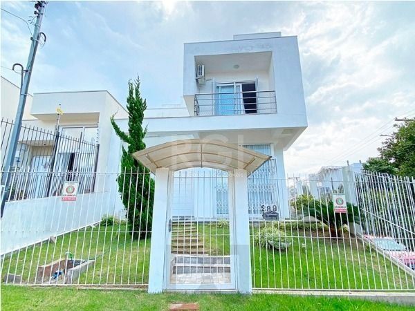 Casa em Porto Alegre, no bairro Aberta dos Morros, com 3 dormitório(s), e 3 banheiros, à venda. — foto 1