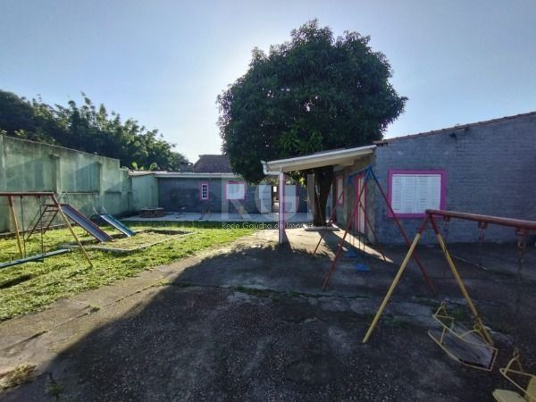 Casa em Porto Alegre, no bairro Belém Novo, com 5 dormitório(s), e 5 banheiros, à venda. — foto 15