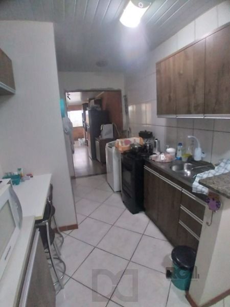 Casa em Porto Alegre, no bairro Hípica, com 2 dormitório(s), e 2 banheiros, à venda. — foto 9