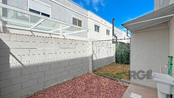 Casa em Porto Alegre, no bairro Vila Nova, com 2 dormitório(s), e 2 banheiros, à venda. — foto 12