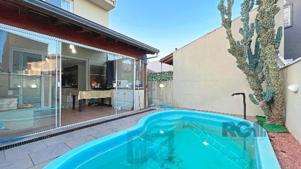Casa em Porto Alegre, no bairro Hípica, com 3 dormitório(s), e 3 banheiros, à venda. — foto 25