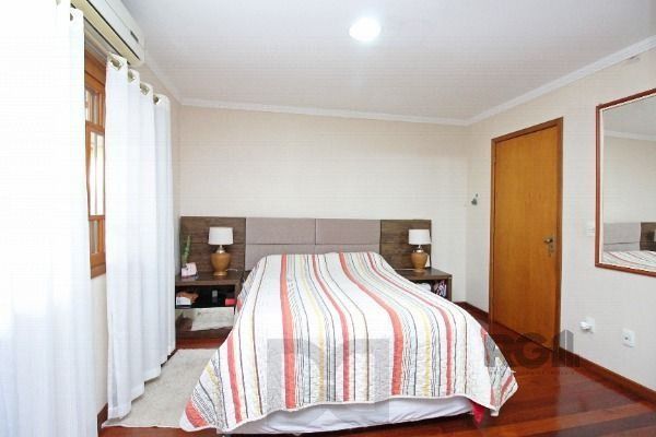 Casa em Porto Alegre, no bairro Belém Novo, com 3 dormitório(s), e 3 banheiros, à venda. — foto 18