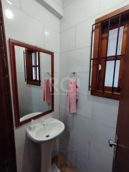 Casa em Porto Alegre, no bairro Hípica, com 3 dormitório(s), e 3 banheiros, à venda. — foto 10