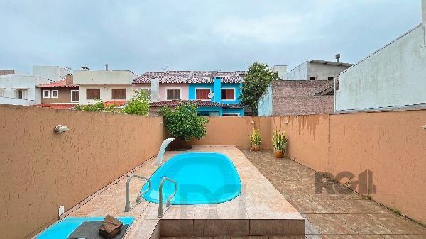 Casa em Porto Alegre, no bairro Hípica, com 3 dormitório(s), e 3 banheiros, à venda. — foto 21