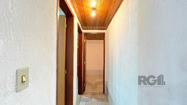 Casa em Porto Alegre, no bairro Guarujá, com 2 dormitório(s), e 2 banheiros, à venda. — foto 22