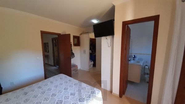 Casa em Porto Alegre, no bairro Espírito Santo, com 3 dormitório(s), e 3 banheiros, à venda. — foto 12