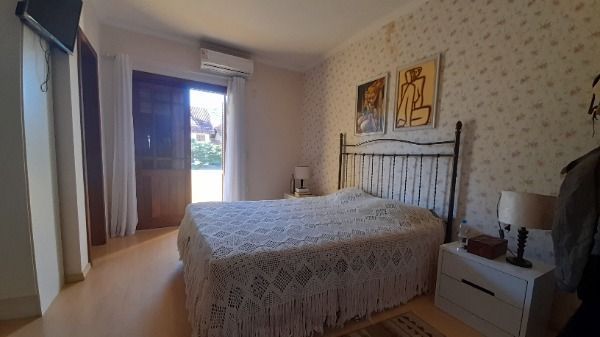 Casa em Porto Alegre, no bairro Espírito Santo, com 3 dormitório(s), e 3 banheiros, à venda. — foto 11
